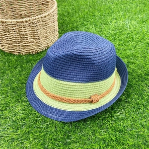 Contrast straw fedora hat in navy blue and green for beach vacations and sun protection