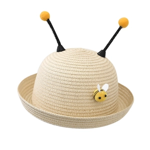Kids bee-themed straw sun hat with cute 3D plush bumblebee and antennae on white background