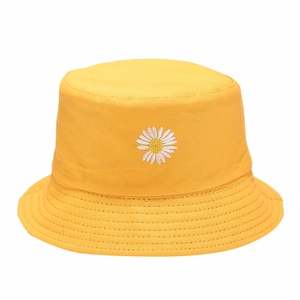 Classic yellow cotton bucket hat with white daisy embroidery on clean white background