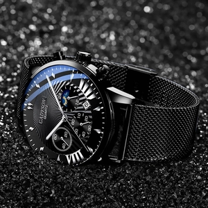 Detail view of Roman style black mesh watch with blue-coated glass and date display