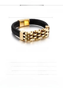 Detail of 316L stainless steel magnetic clasp on black braided leather bracelet for men