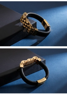 Close-up of woven leather bracelet with golden magnetic clasp and horseshoe buckles