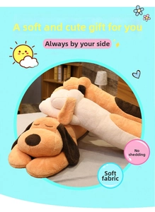 Detailed view of long plush dog pillow in soft orange and white fabric with embroidery