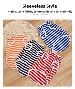 Close-up of striped sleeveless dog vests in orange, blue, black, and red colors