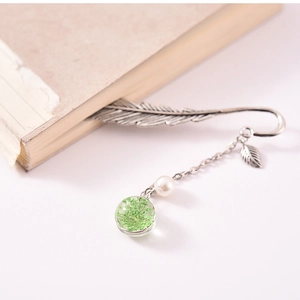 Silver metal feather bookmark with green dried flower and pearl glass ball pendant