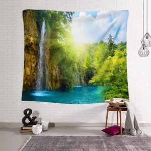 Scenic tapestry hanging on white brick wall showing forest lake landscape for home decor