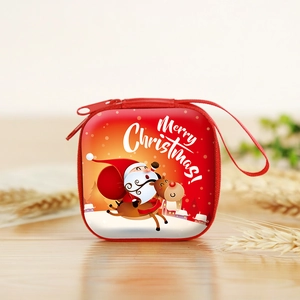 Christmas coin purse with Santa illustration on wooden background with a red lanyard