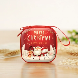 Detail of Christmas coin purse with festive prints on a warm wooden background