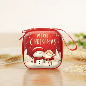 Detail of red square Christmas coin purse with Santa and Snowman print and hand strap