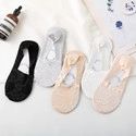 Flat lay of five lace-trim invisible socks in black, gray, beige, white, and pink tones