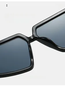 Close-up of comfortable nose pads on irregular square black metal frame sunglasses