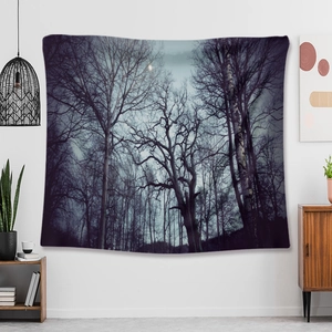 Detail of winter forest tapestry with dark trees on white wall for home decor