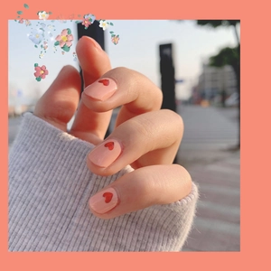 Peach pink polka dot nail stickers with red heart pattern and glossy finish for women