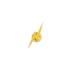 Detail of yellow enamel lightning bolt brooch with gold-plated edges and butterfly clutch