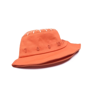 Orange cotton bucket hat for kids featuring numerical embroidery and a sun-shading brim