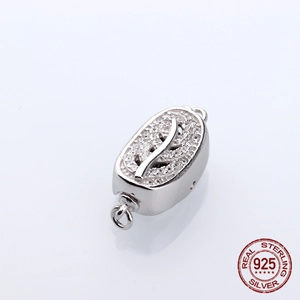 Macro shot of S925 sterling silver leaf clasp with white zircon stones for jewelry DIY