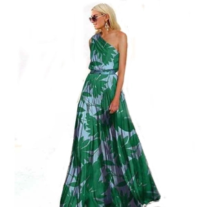 Elegant one-shoulder maxi dress featuring tropical green leaf prints on a white background