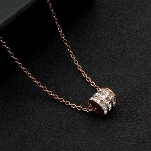 Elegant rose gold cylinder pendant necklace with three rows of clear crystals for women