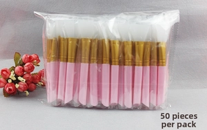 Bulk set of 50 silicone face mask brushes with pink handles and golden ferrules