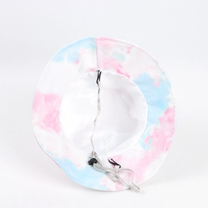 Detail view of tie-dye bucket hat with pink and blue pattern and adjustable chin strap