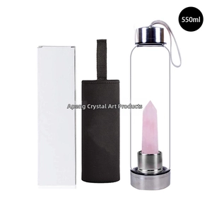 Detail view of 550ml glass water bottle with pink crystal column and black sleeve