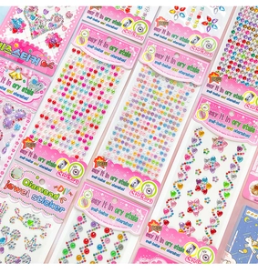 Detailed view of colorful DIY 3D diamond jewel stickers in various heart and flower shapes