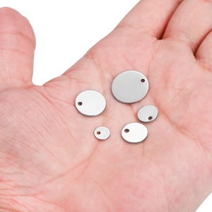 Five assorted sizes of round stainless steel blank pendants for laser engraving jewelry