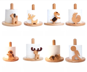 Detailed grid of diverse wooden animal character tissue holders made of beech and walnut wood