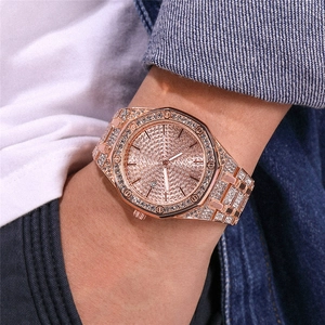 Macro view of luxury rose gold iced-out watch with crystal-encrusted octagonal bezel