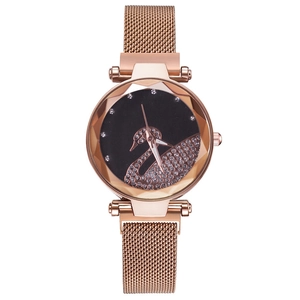 Detailed front view of women's rose gold quartz watch with swan motif and rhinestone dial