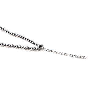 Close-up of titanium steel ball chain with silver lobster clasp and extension link