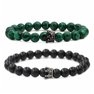 Malachite and matte black lava stone couple crown bracelets set on white background