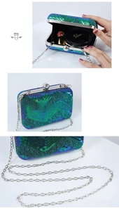 Detail of sequin evening bag showing inner space for cosmetics and metal chain strap