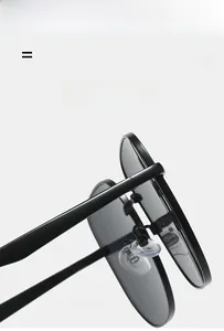 Detail of lightweight flexible black frame sunglasses with smooth texture and integrated nose pads