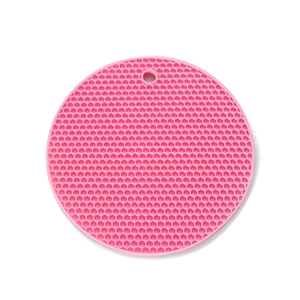 Pink round honeycomb silicone placemat with heat-resistant texture and hanging hole