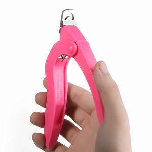 Professional pink U-shaped nail clipper for acrylic nails being held against white background