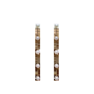 Elegant long pearl drop earrings with gold chains and five white pearls for women