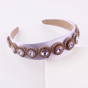 Baroque purple satin headband with colorful rhinestones and gold-tone gemstone accents