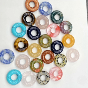 Macro shot of assorted 20mm natural stone abacus beads with large 8mm holes for jewelry DIY