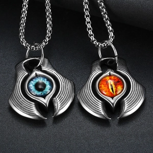 Retro punk demon eye and hand pendants in blue and lava colors with silver bead chains