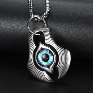 Retro punk demon eye pendant necklace in vintage silver finish with blue eye detail