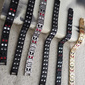 Titanium steel magnetic bracelets for men in black, gold and silver finishes