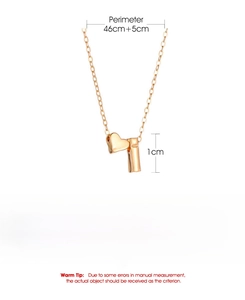 Detail of gold heart pendant necklace showing dimensions and 46cm chain length on white background