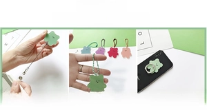 Three functional styles of acrylic bear badges: retractable reel, chain, and phone ring grip