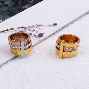 Three-layer 18k gold plated stainless steel stacked ring with pavé crystals and tricolor bands