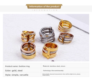Detailed view of six stacked stainless steel rings in gold and silver with zircon stones