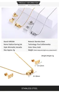 Detailed view of I heart U necklace and stud earrings set in polished stainless steel