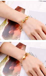 Adjustable gold stainless steel bracelet with S and O letter cubes and heart charms