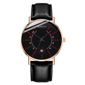 Detail of Geneva quartz watch with rose gold case, red markers, and date window
