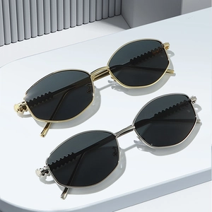 Modern oval polygon sunglasses with wavy metal temples in gold and silver frames